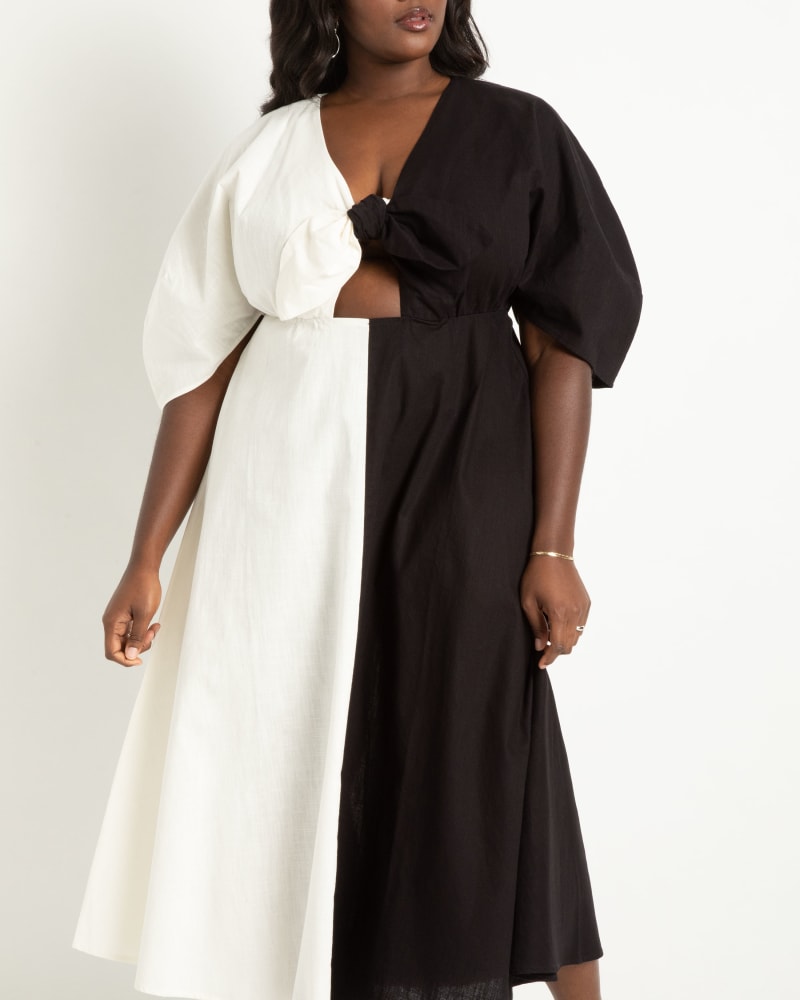 Front of a model wearing a size 16 Two-Tone Linen Dress With Tie Front in Black Onyx/Snow White by ELOQUII. | dia_product_style_image_id:303873